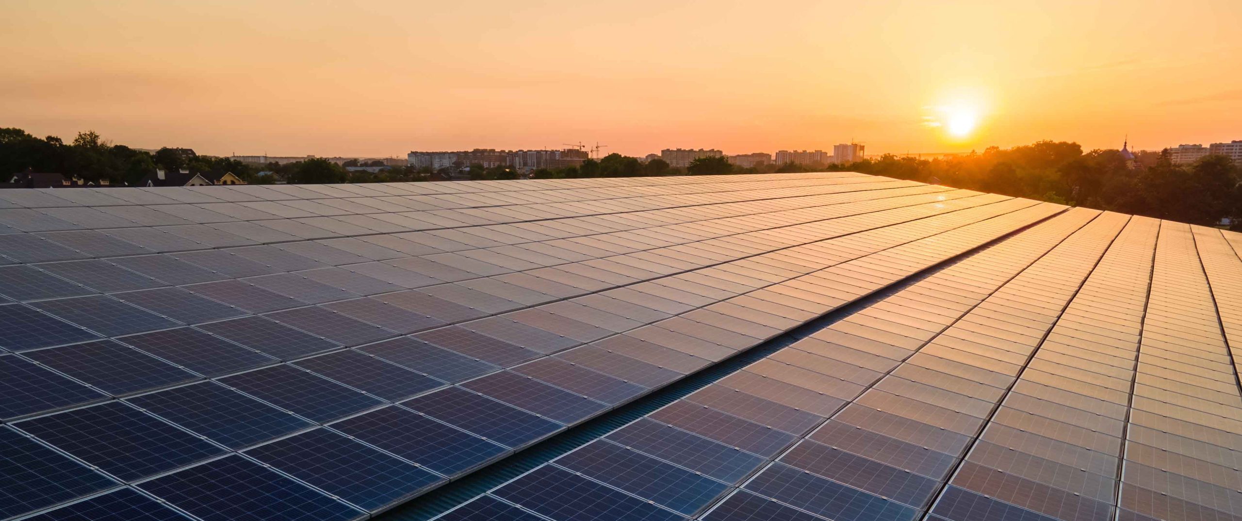 Solar panels in a sun rise